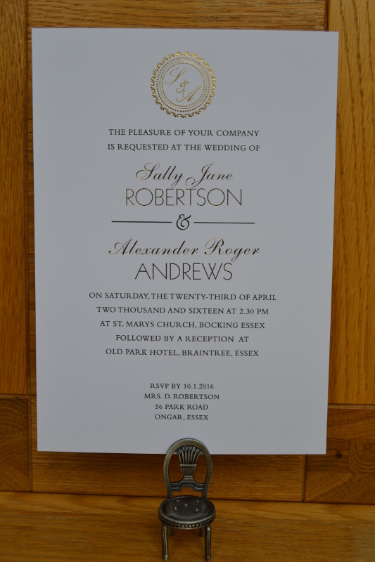 Gold foil wedding invitation printed on white board